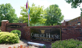carriage house apartment sign 