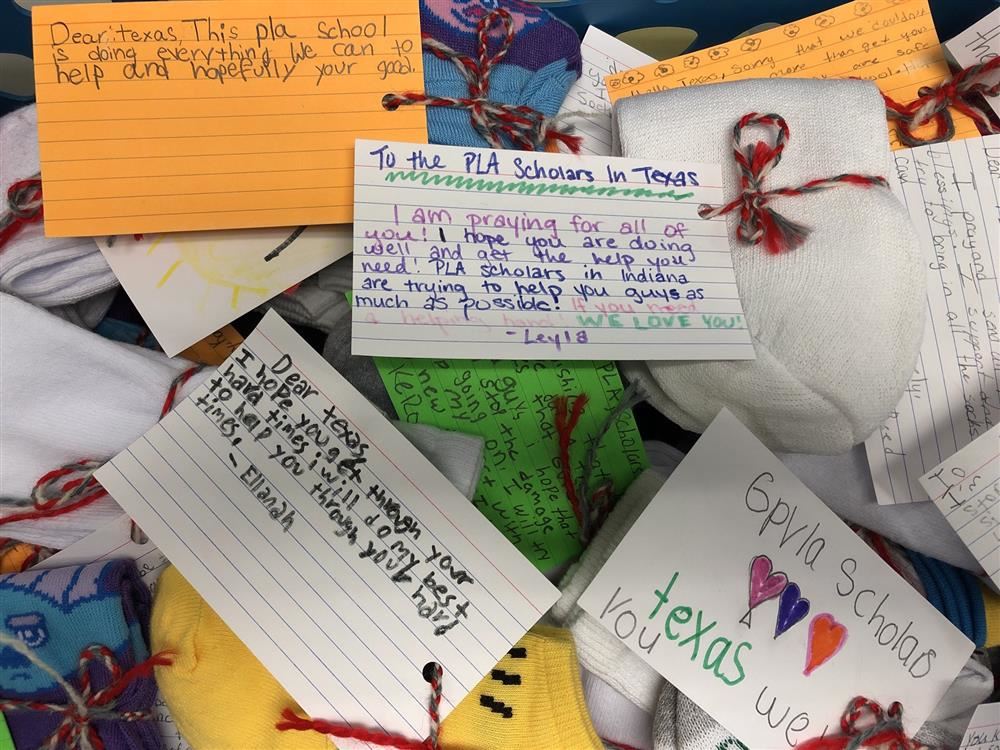 GVP scholars write notes of encouragement to Texas scholars impacted by Tropical Storm Imelda. 